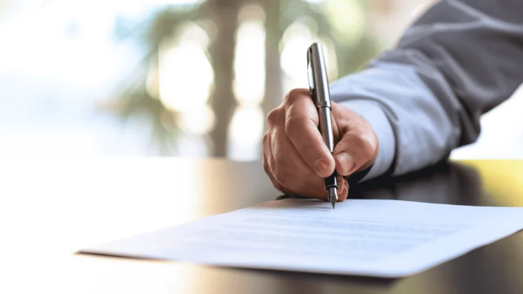 Person signing contract