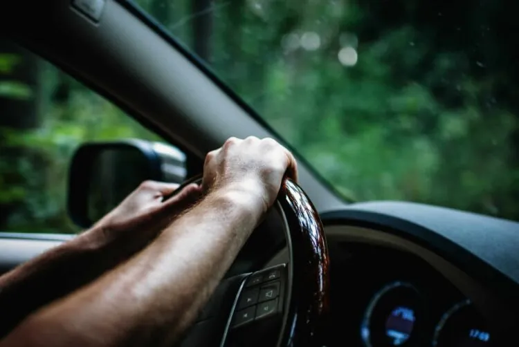 person driving a car