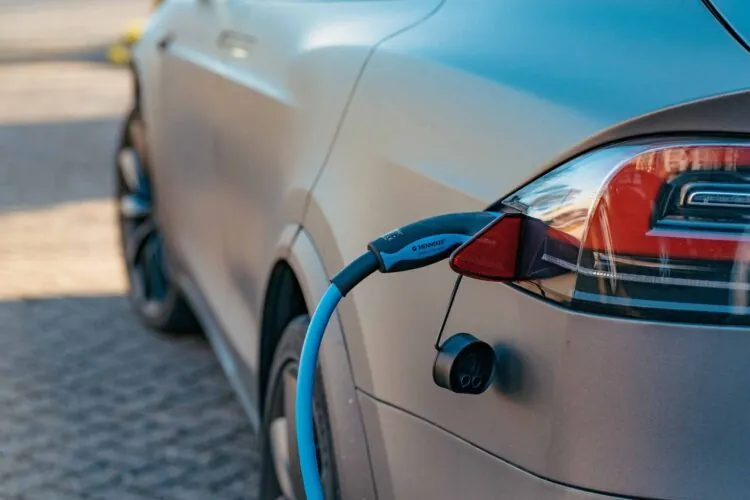 an electric vehicle being charged
