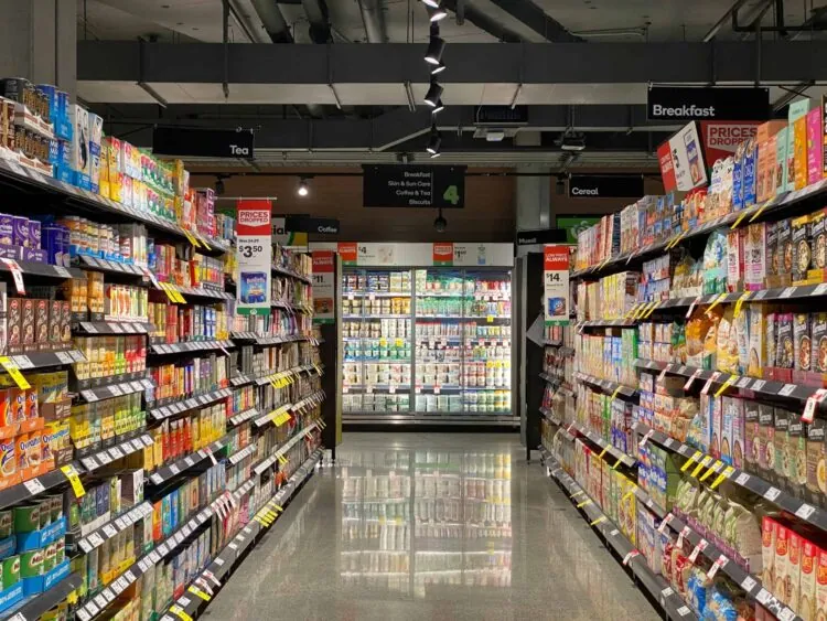 grocery store aisle with various foods on display