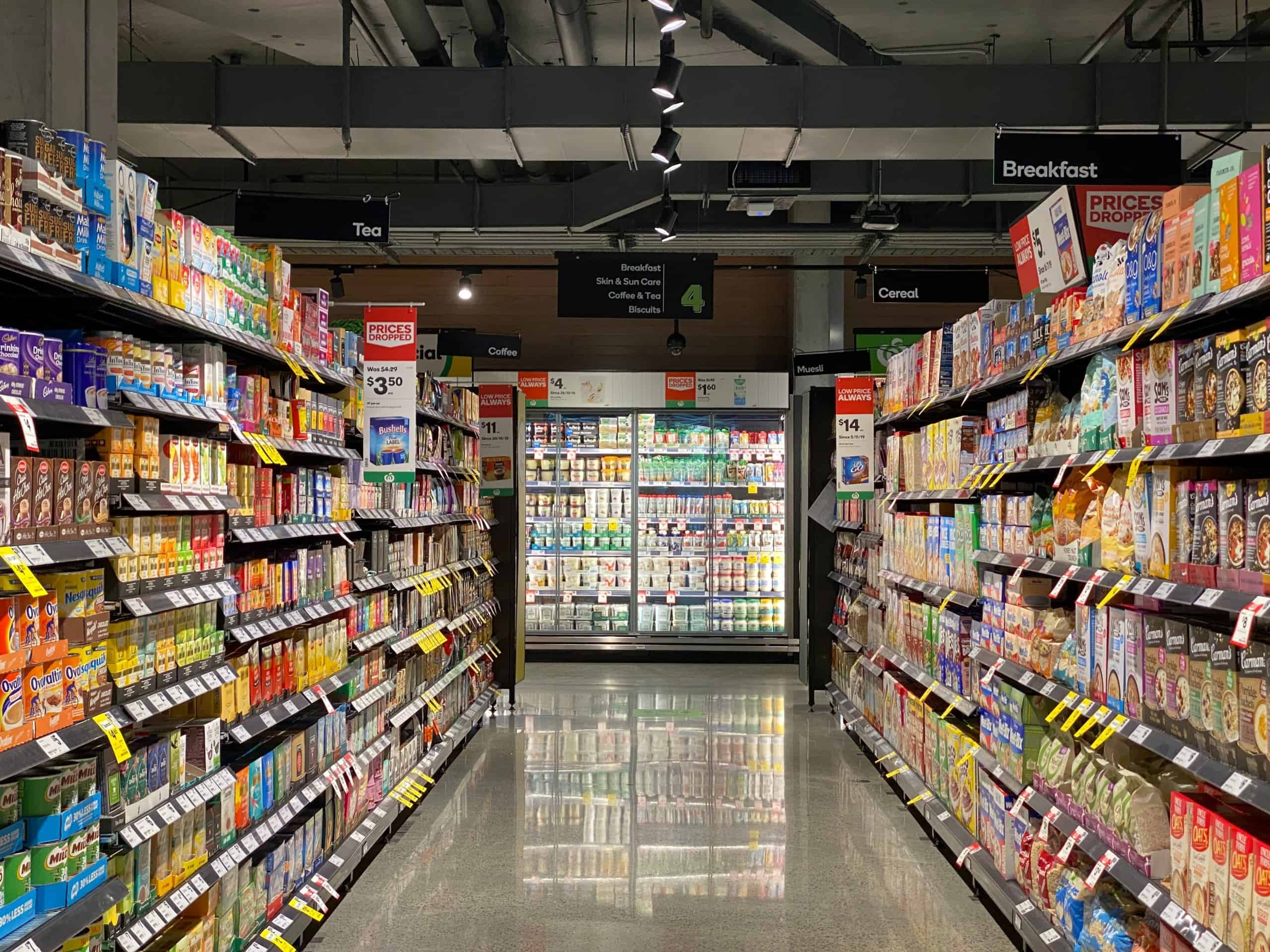 grocery store aisle with various foods on display