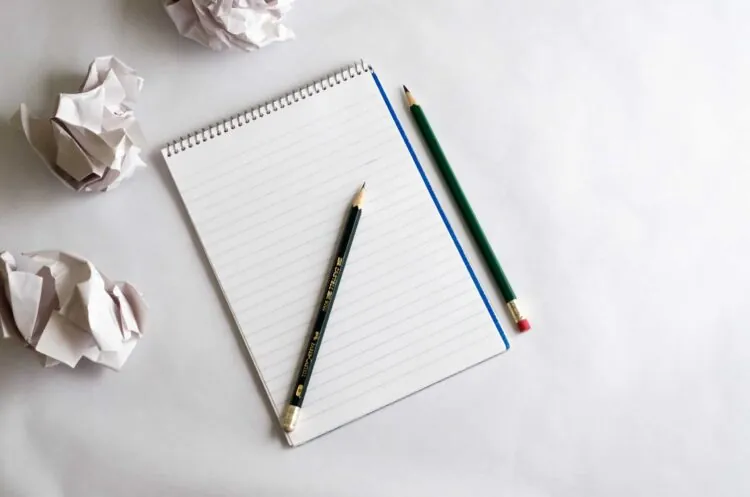 notepad and pencils