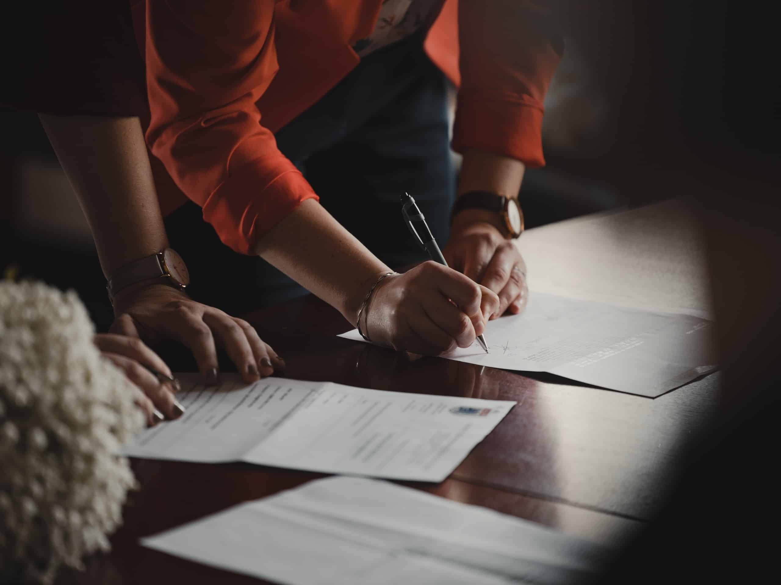 business people signing contract