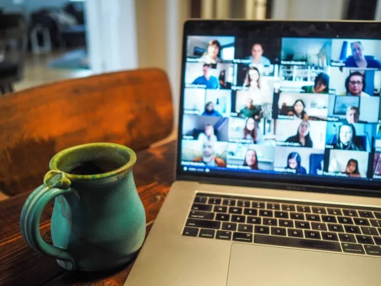 laptop displaying virtual meeting