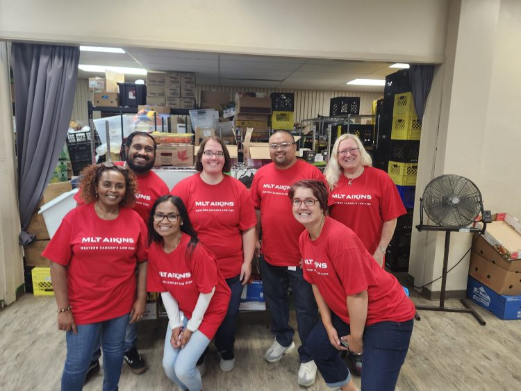 MLT Aikins team volunteering at Agape Table
