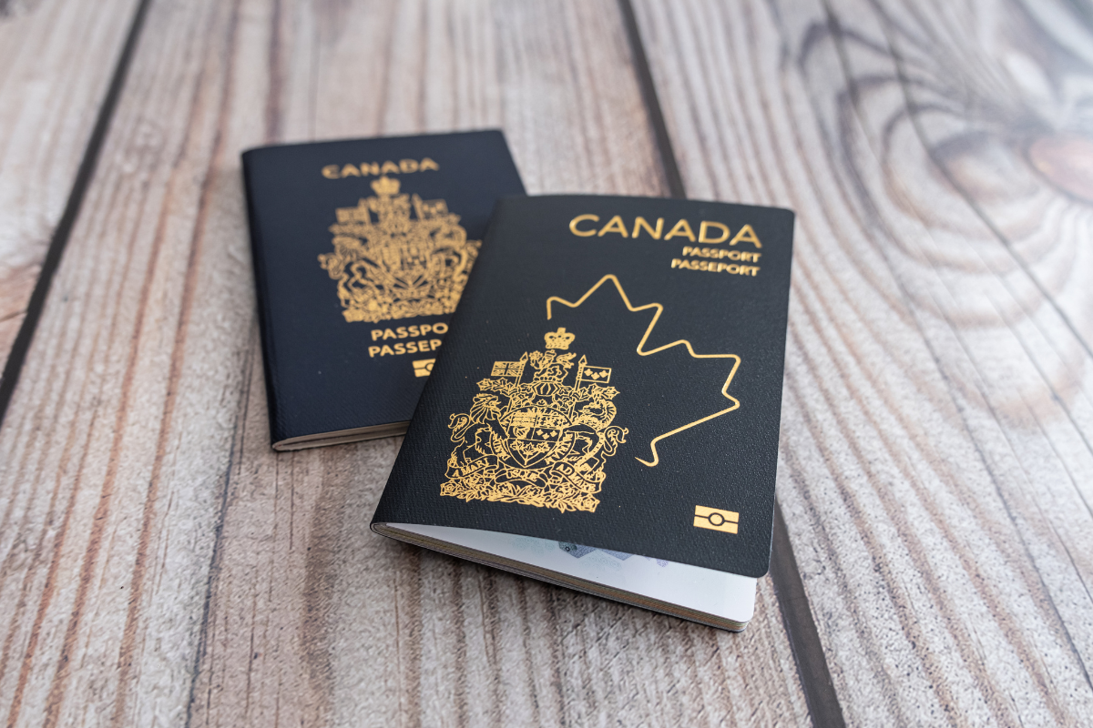 Old and new style Canadian passports