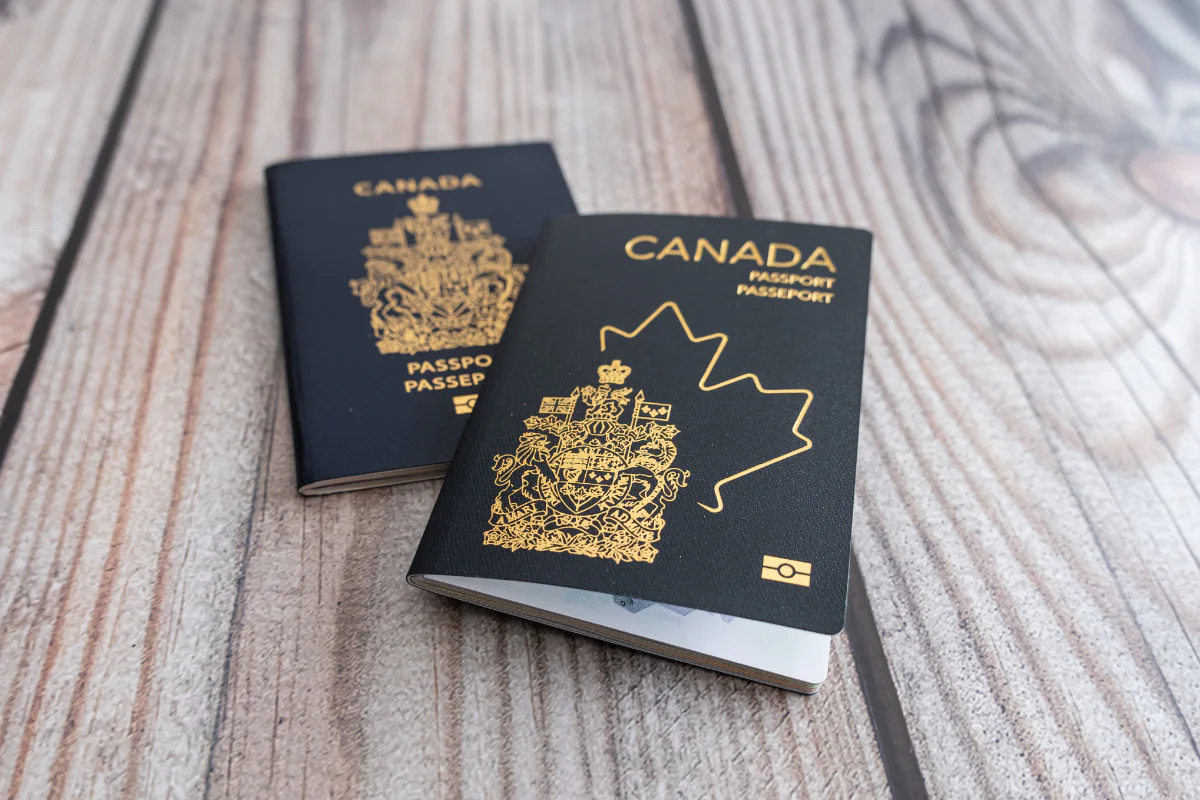 Old and new style Canadian passports