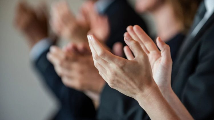 Business people applauding