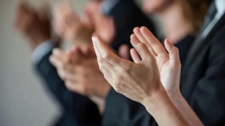 Business people applauding