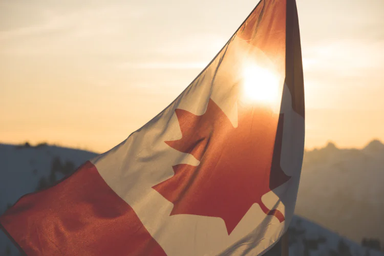 Canada flag illuminated by sun