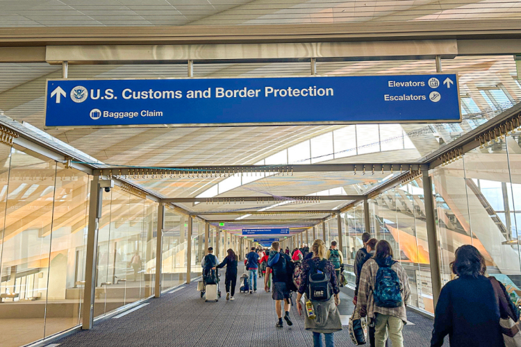 A photo of the U.S. Customs and Border Protection sign in Los Angeles Airport
