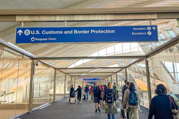 A photo of the U.S. Customs and Border Protection sign in Los Angeles Airport