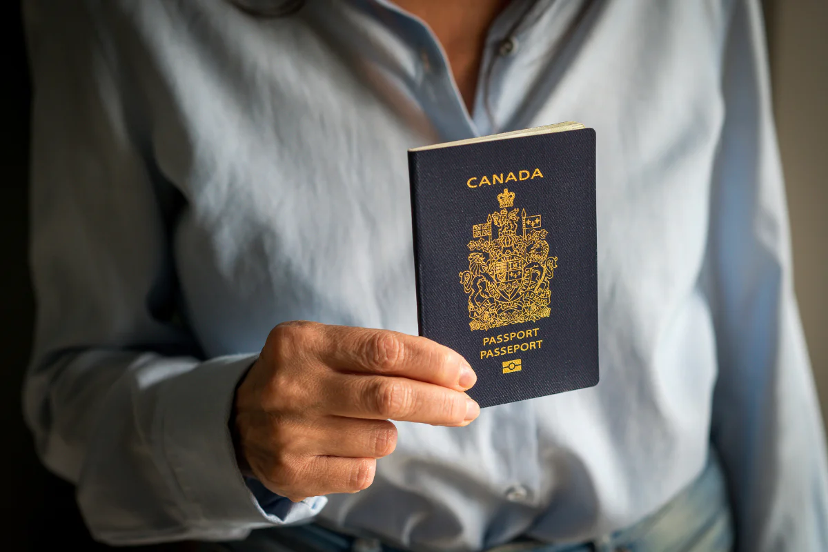 Person holding Canadian passport