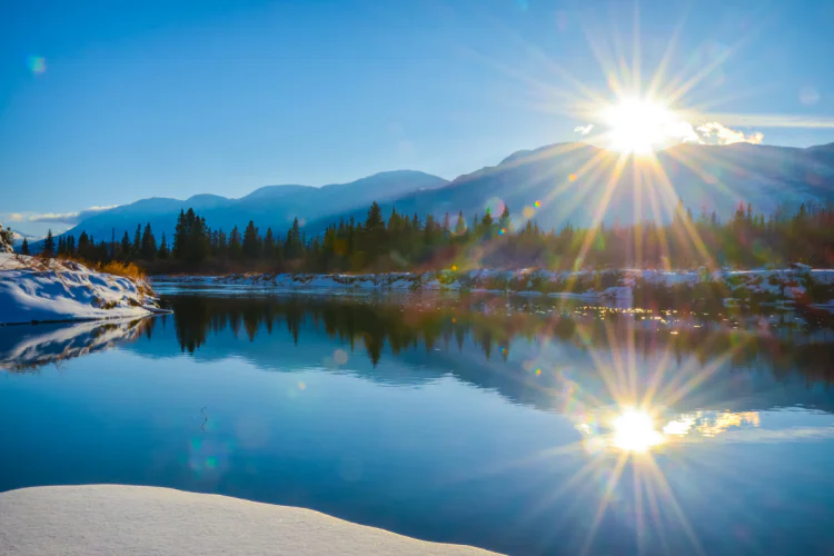 The sun shining over the British Columbia River