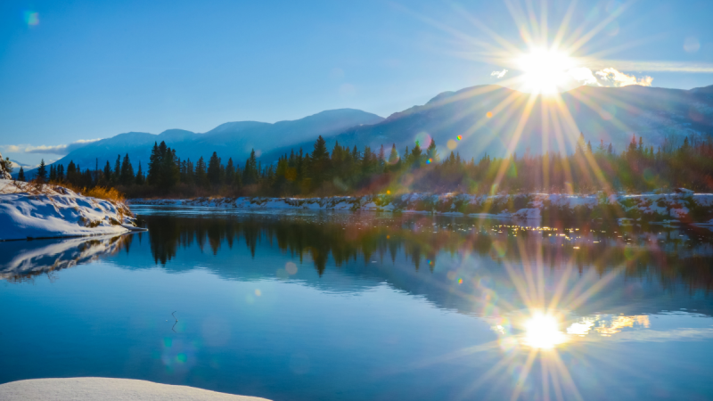The sun shining over the British Columbia River