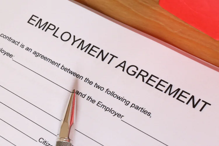 A closeup photo of an employment agreement