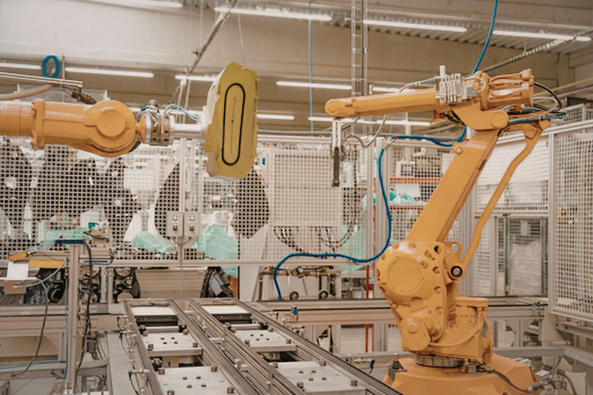 Robots working on an industrial assembly line