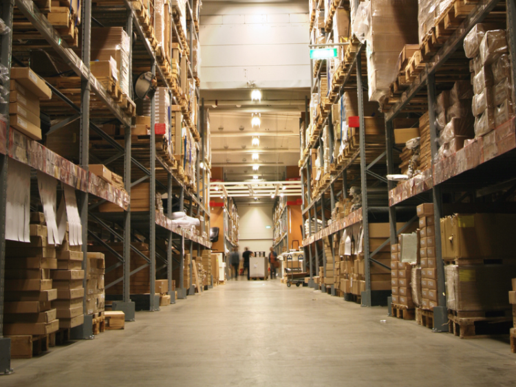 A shipping warehouse with full shelves