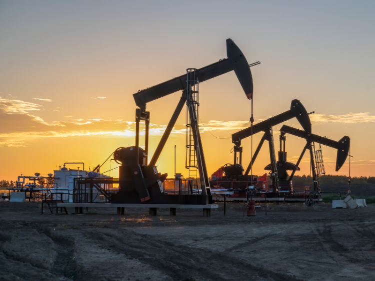Alberta oil wells at sunset