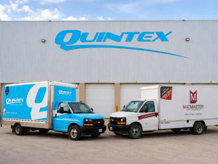 Quintex and Mat Master trucks in front of a Quintex facility